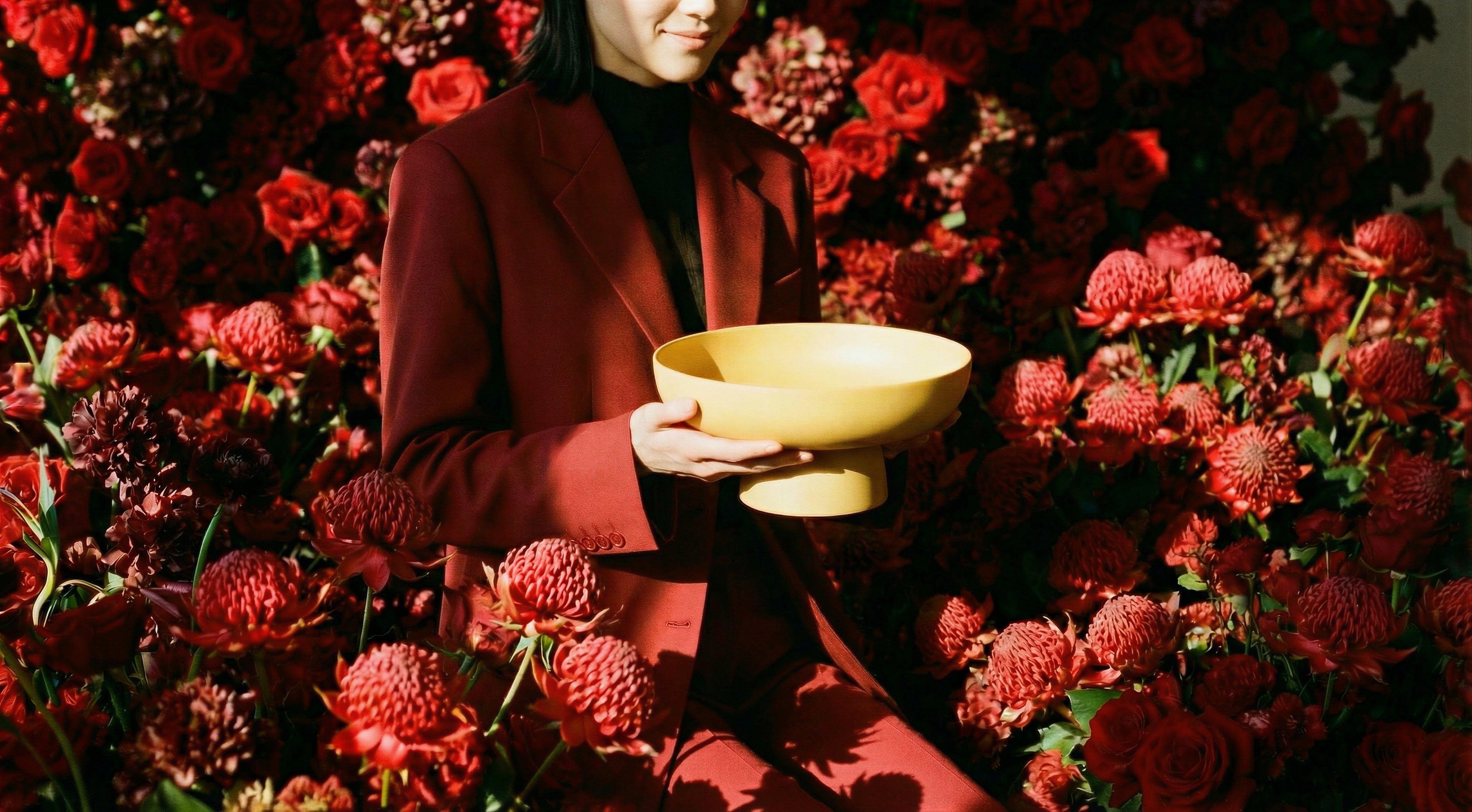 Editorial lifestyle image featuring the Runda Bowl by Maxim Vogel styled as a sculptural homewares piece in a modern interior setting.